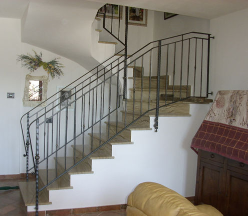 railing for interior with wrought vertical elements